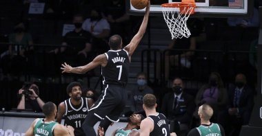 Boston Celtics guard Marcus Smart (3rd R) draws an offensive foul as the Brooklyn Nets forward Kevin Durant (C) drives to the basket during an NBA playoffs game at the Barclays Center in Brooklyn, New York, U.S., May 22, 2021. (EPA Photo)
