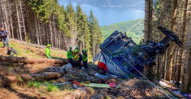 A handout photo made available by the press office of the Corpo Nazionale Soccorso Alpino Speleologico (CNSAS), Italy's national mountain rescue service, shows the scene of a cable car accident near Lake Maggiore, in Verbania, northern Italy, May 23, 2021. (EPA Photo)