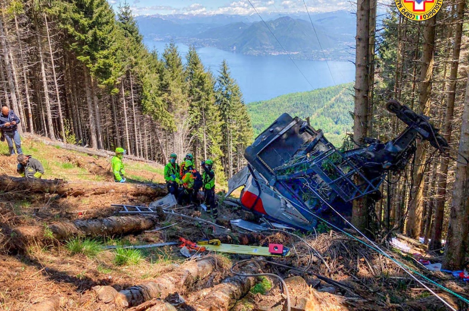 A handout photo made available by the press office of the Corpo Nazionale Soccorso Alpino Speleologico (CNSAS), Italy's national mountain rescue service, shows the scene of a cable car accident near Lake Maggiore, in Verbania, northern Italy, May 23, 2021. (EPA Photo)
