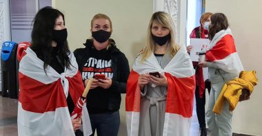 Supporters of Belarusian opposition blogger and activist Roman Protasevich wait for the arrival of a Ryanair flight after it was diverted to Belarus at Vilnius Airport in Vilnius, Lithuania May 23, 2021. (Reuters Photo)