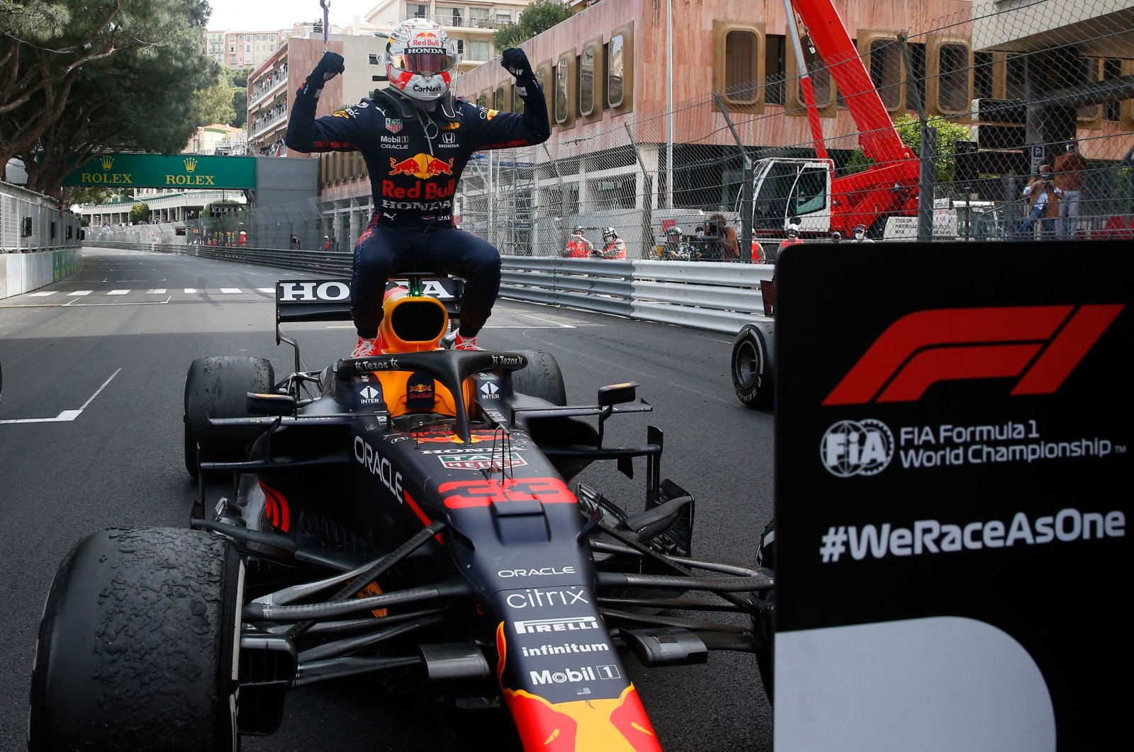 Red Bull's Dutch driver Max Verstappen celebrates winning the Monaco Formula 1 Grand Prix at the Monaco street circuit, Monaco, May 23, 2021. (AFP Photo)