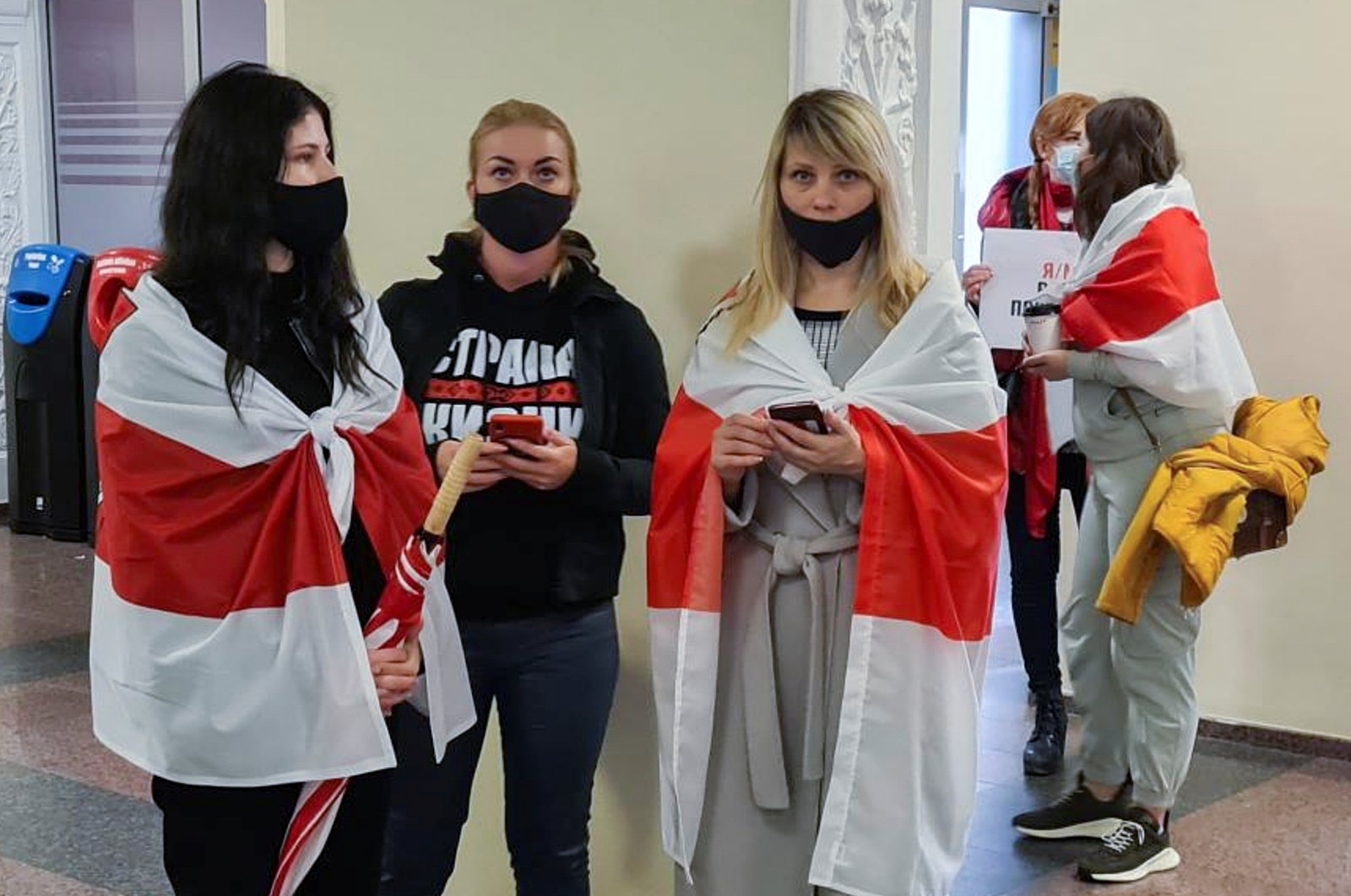 Supporters of Belarusian opposition blogger and activist Roman Protasevich wait for the arrival of a Ryanair flight after it was diverted to Belarus at Vilnius Airport in Vilnius, Lithuania May 23, 2021. (Reuters Photo)