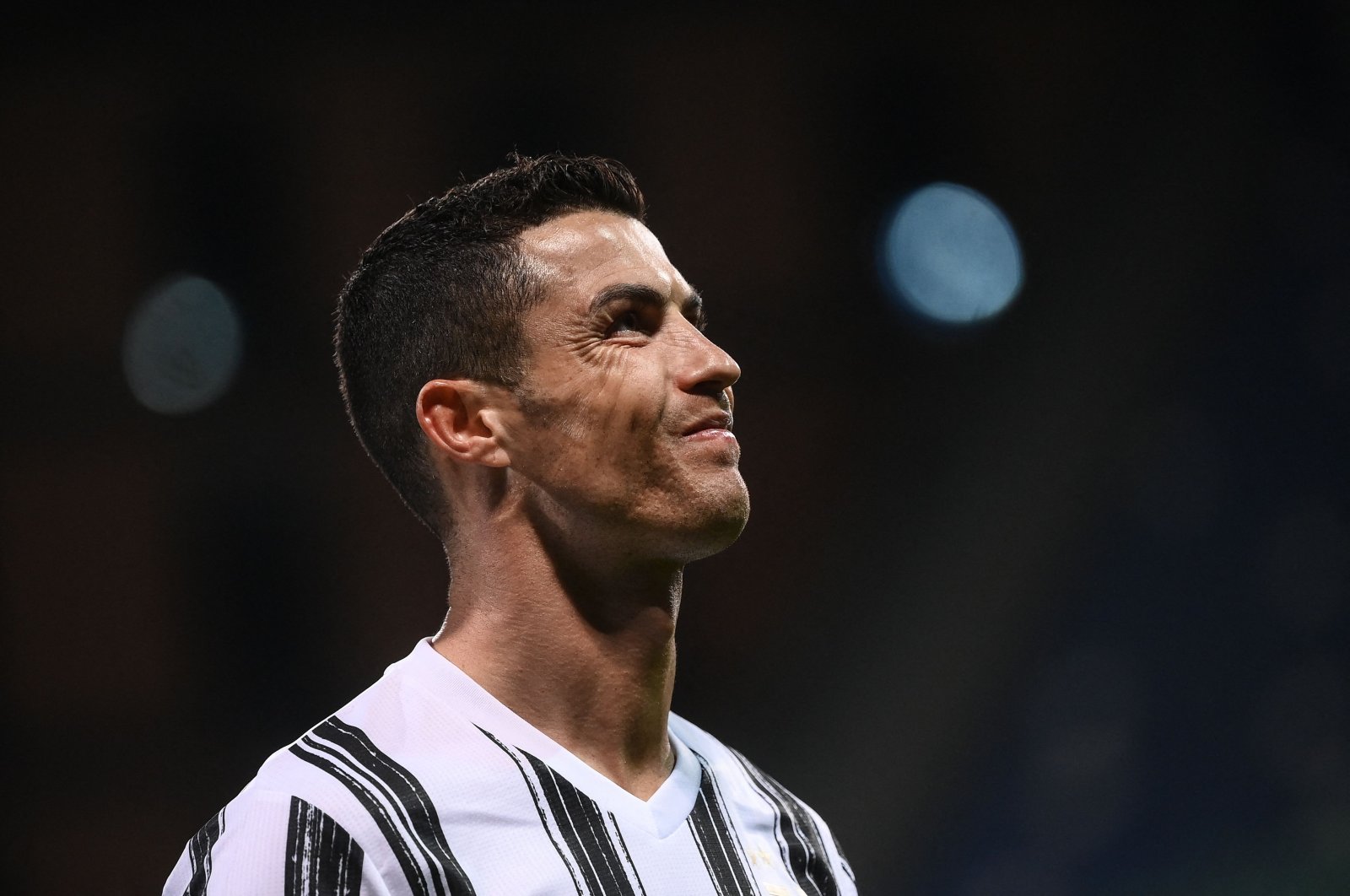 Juventus' Portuguese forward Cristiano Ronaldo reacts during the Italian Serie A match against Sassuolo, Reggio Emilia, Italy, May 12, 2021. (AFP Photo)