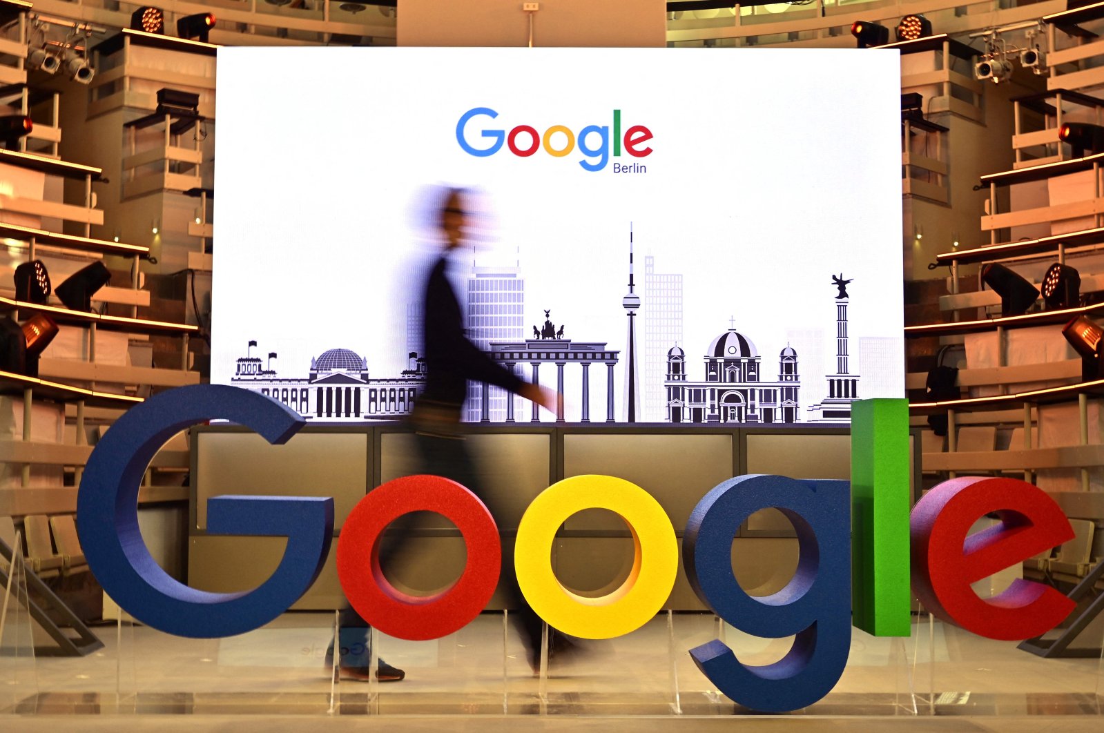 A technician passes by the logo of U.S. internet search giant Google during the opening day of a new office in Berlin, Germany, Jan. 22, 2019. (AFP Photo)