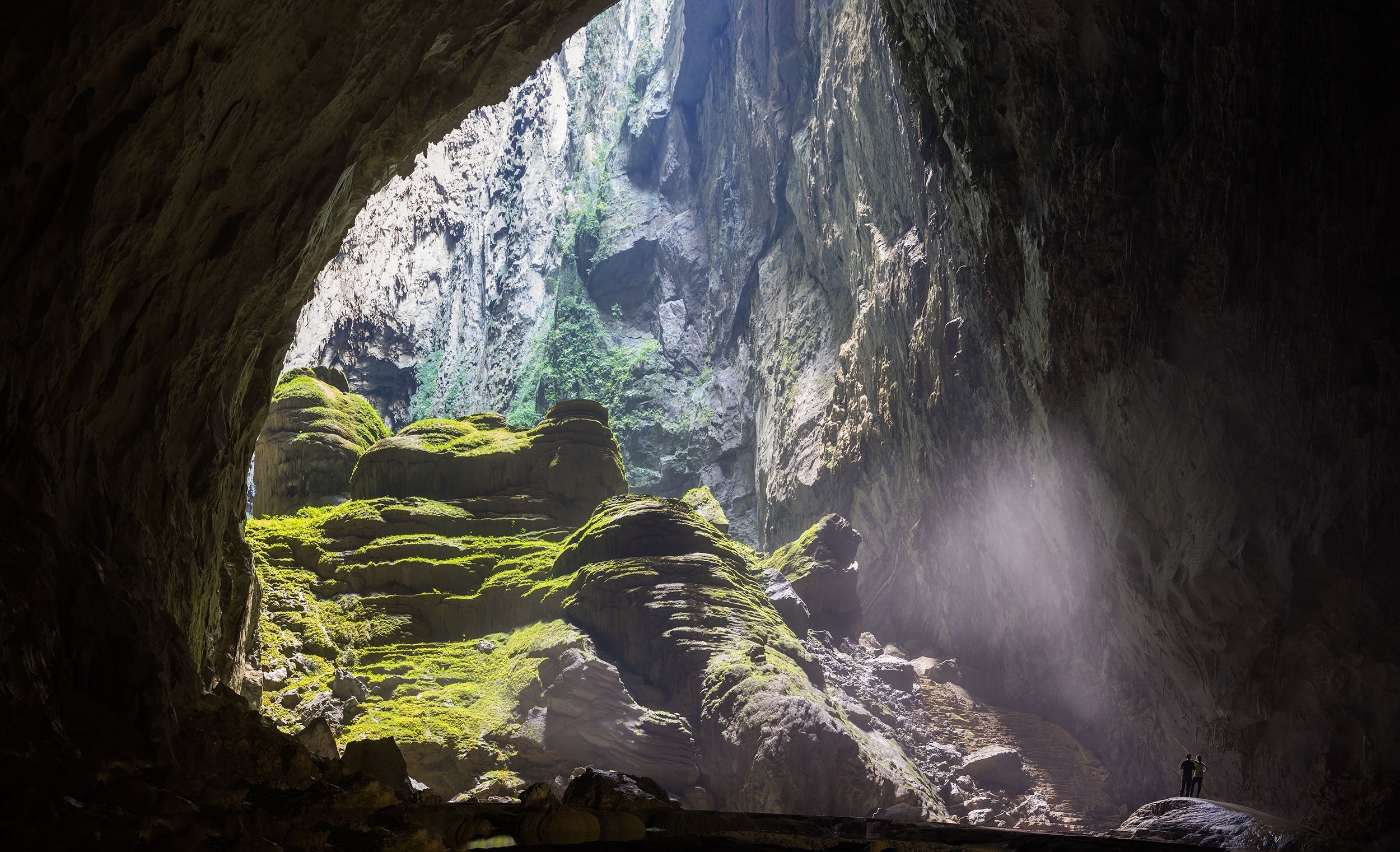 Sun shines through the entrance of the Son Doong Cave in the Phong Nha-Ke Bang National Park, which is a UNESCO World Heritage Site in the Quang Binh province, Vietnam. (Shutterstock Photo)