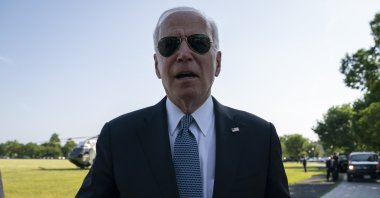 U.S. President Joe Biden talks with reporters before boarding Marine One for a trip to Delaware, in Washington, U.S., May 25, 2021. (AP Photo)