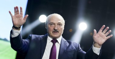 Belarusian President Alexander Lukashenko gestures as he addresses a women's forum in Minsk, Belarus, Sept. 17, 2020. (TUT.by via AP)