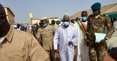 Malian Prime Minister Moctar Ouane and his delegation attend the inauguration of the new river port of Konna in central Mali, March 20, 2021. (AFP Photo)
