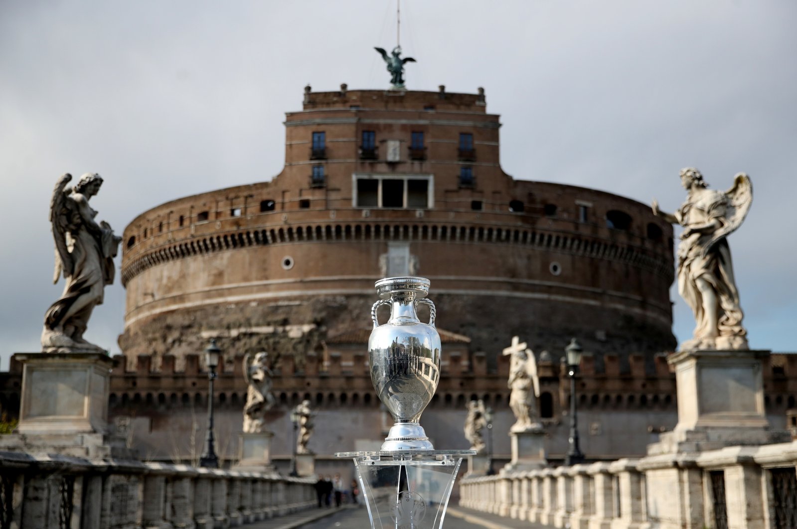 The UEFA European Championship trophy is displayed in Rome, Castel'Angelo Bridge, Rome, Italy, April 20, 2021. (Reuters Photo)