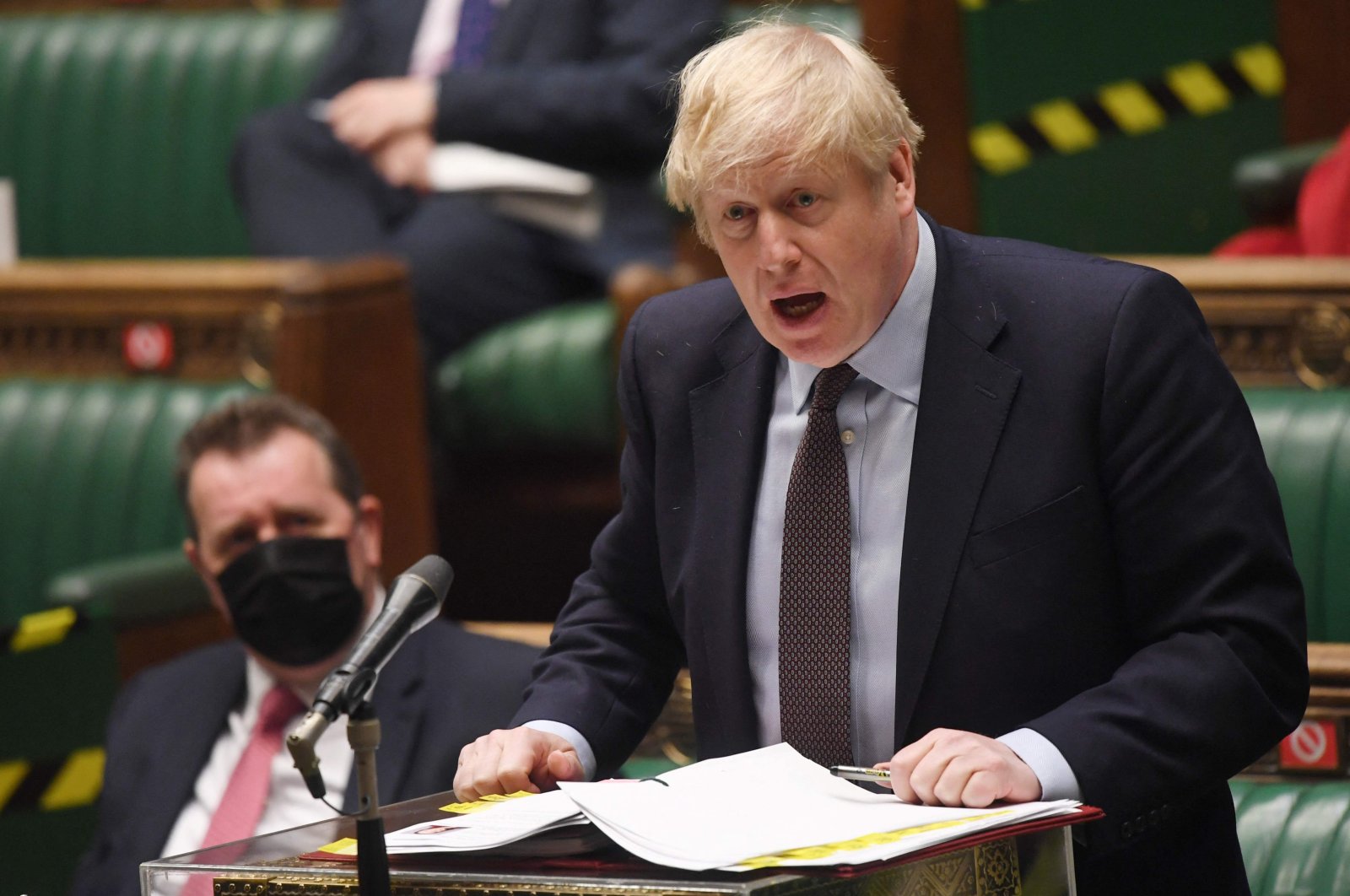 Britain's Prime Minister Boris Johnson attends the weekly Prime Minister's Questions (PMQs) in the House of Commons in London, England, May 26, 2021. (AFP Photo/UK Parliament/Jessica Taylor)