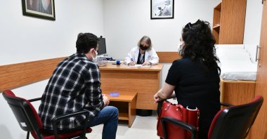A couple in a doctor's office before their SMA test, in the capital Ankara, Turkey, May 27, 2021. (AA PHOTO)
