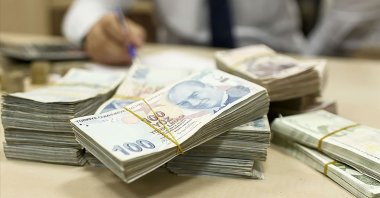 This Sabah file photo shows stacks of Turkish lira.