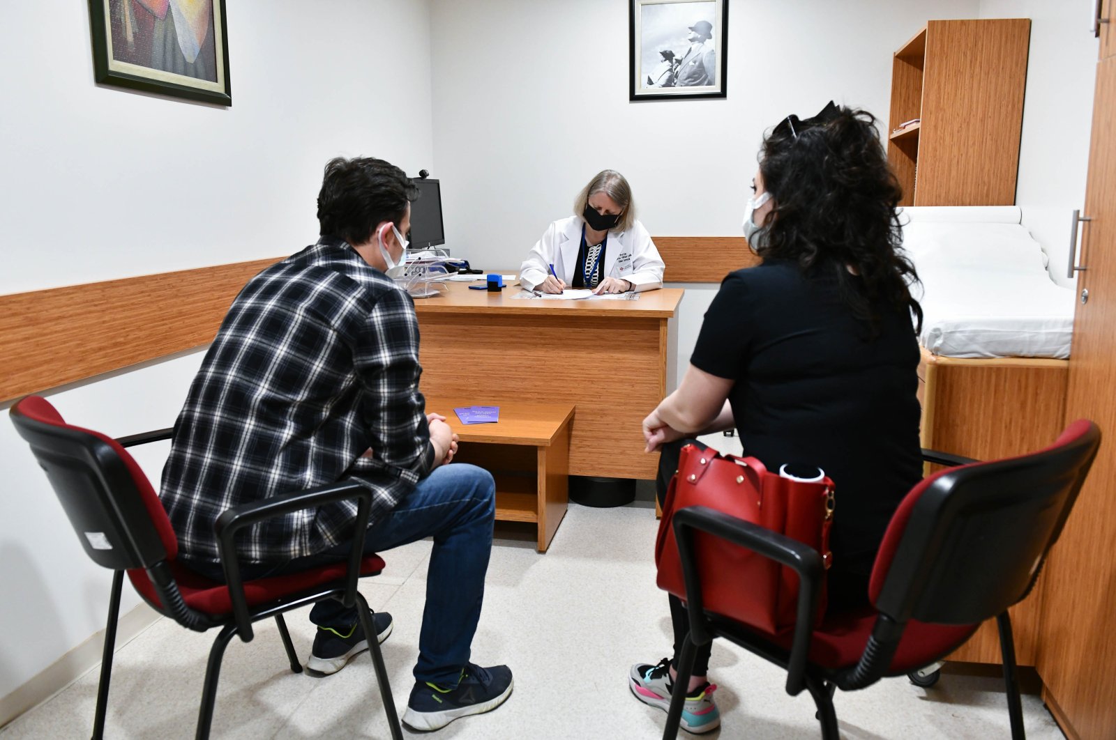A couple in a doctor's office before their SMA test, in the capital Ankara, Turkey, May 27, 2021. (AA PHOTO)