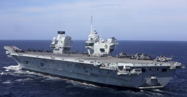 Military personnel participate in the training exercise NATO Steadfast Defender 2021 on board the aircraft carrier HMS Queen Elizabeth off the coast of Portugal, May 27, 2021. (AP Photo)