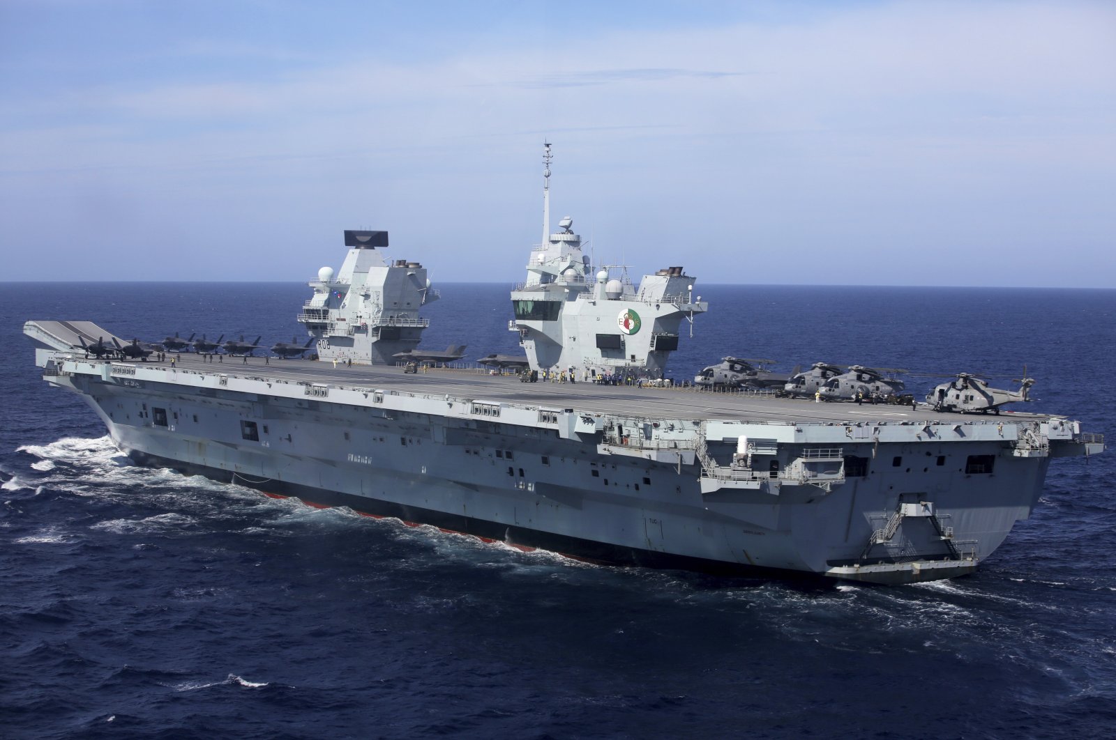 Military personnel participate in the training exercise NATO Steadfast Defender 2021 on board the aircraft carrier HMS Queen Elizabeth off the coast of Portugal, May 27, 2021. (AP Photo)
