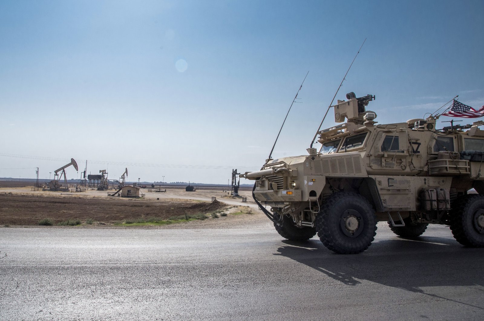 U.S. forces patrol the YPG terrorist group-controlled oil fields in northeast Syria, Oct. 28, 2019, (AP Photo)