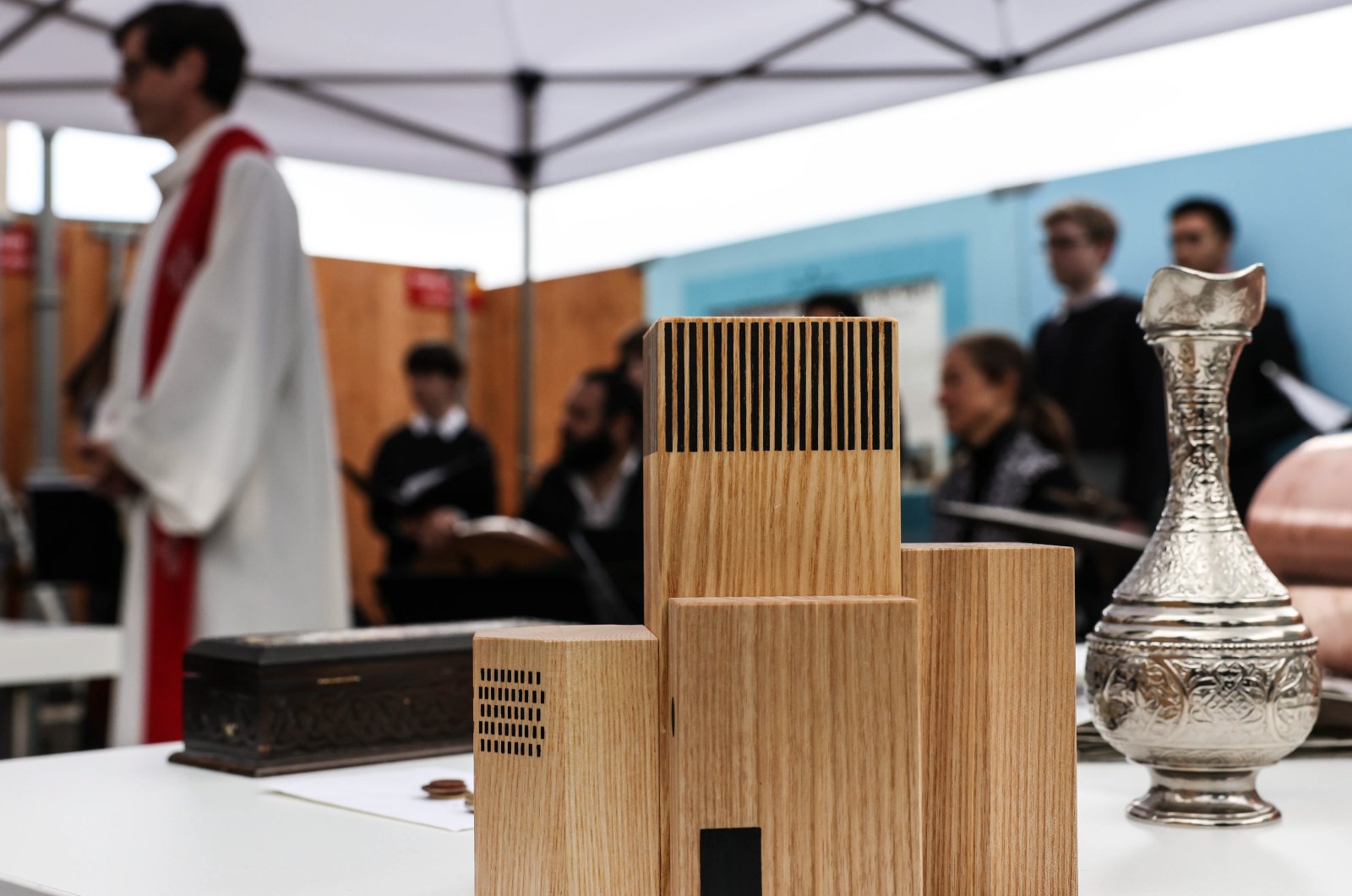 A view of the wooden model of the multi-religious "House of One" building during its laying of the foundation stone ceremony in Berlin, Germany, May 27, 2021. (EPA Photo)