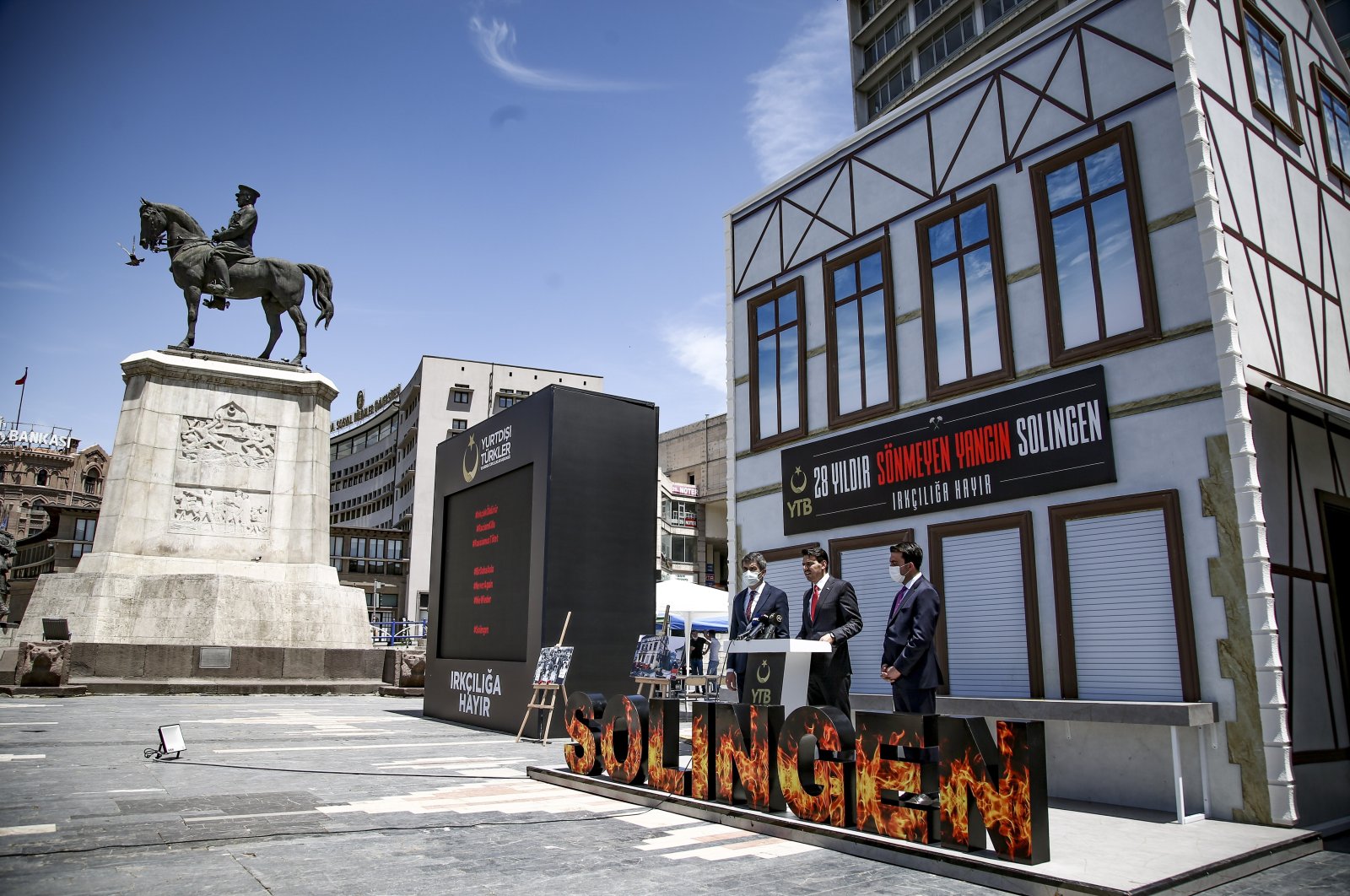 Abdullah Eren speaks at an event in front of the Solingen replica house in the capital, Ankara, Turkey, May 28, 2021. (İHA PHOTO)