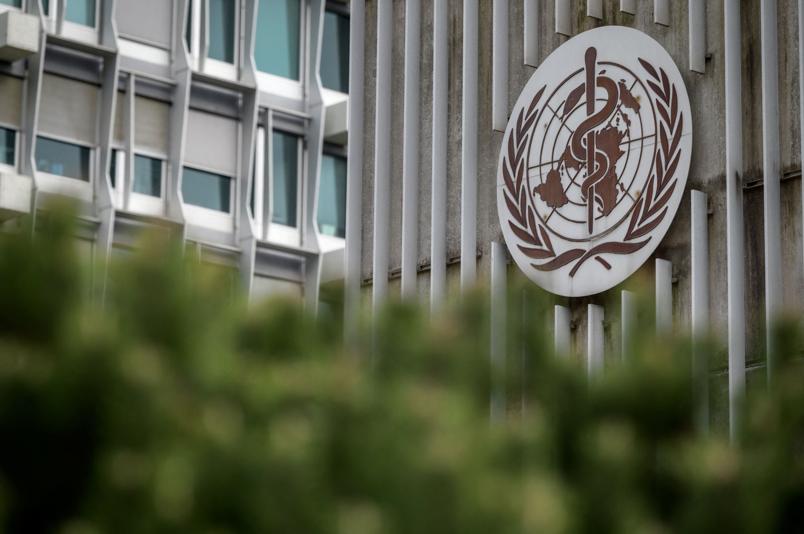 A World Health Organization (WHO) sign hangs outside their headquarters in Geneva, Switzerland, March 05, 2021. (AFP Photo)