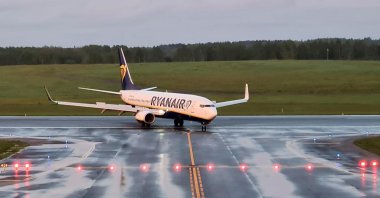 A Ryanair aircraft, which was carrying Belarusian dissident journalist Roman Protasevich and diverted to Belarus, where authorities detained him, lands at Vilnius Airport in Vilnius, Lithuania May 23, 2021. (Reuters Photo) 