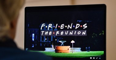 A person watches "Friends: The Reunion" on a laptop in Los Angeles, California, U.S., May 27, 2021. (AFP Photo)