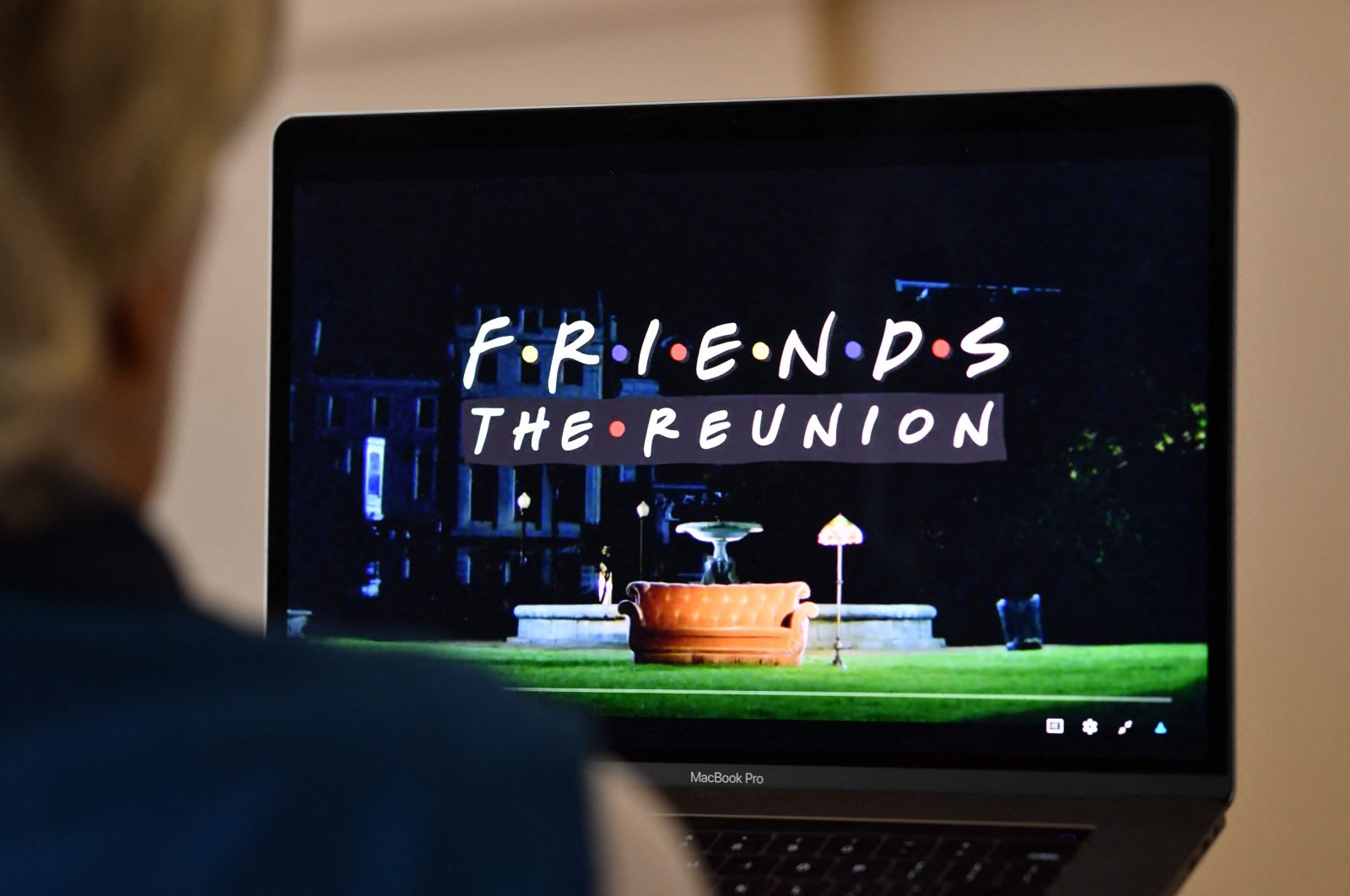 A person watches "Friends: The Reunion" on a laptop in Los Angeles, California, U.S., May 27, 2021. (AFP Photo)