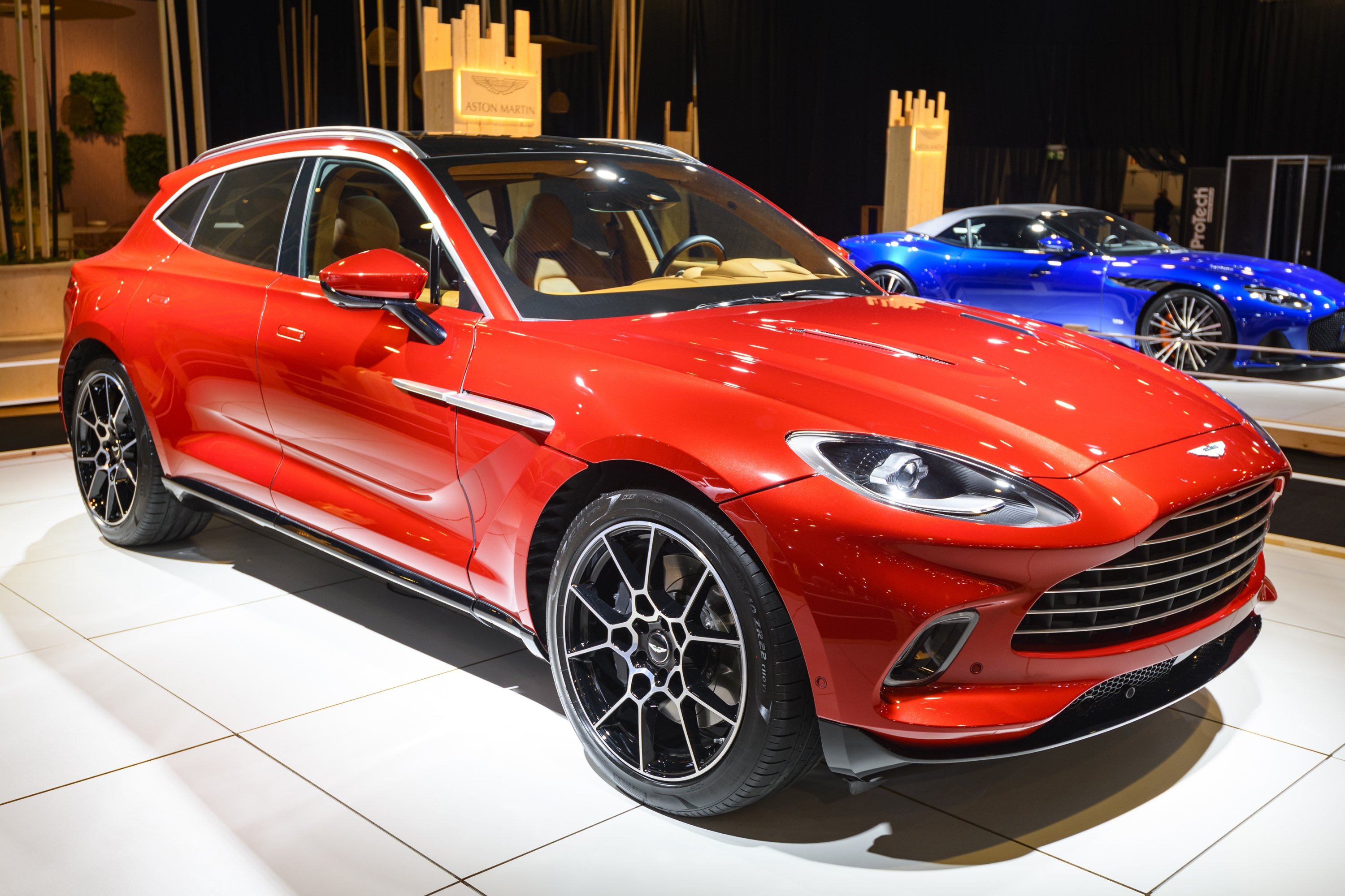 Lights shine on an Aston Martin DBX on display at the Brussels Expo in Brussels, Belgium, Jan. 8, 2020. (Getty Images)