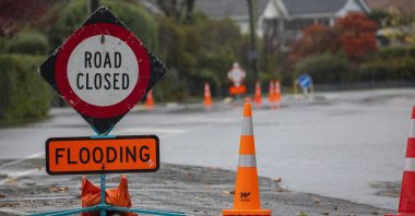 A road closed sign warns drivers of a flooded road in Christchurch, New Zealand, May 30, 2021. (Getty Images)