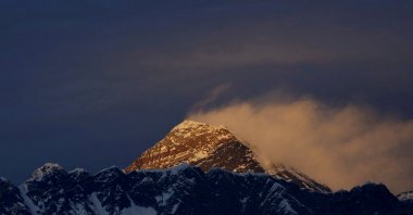 FILE PHOTO: Light illuminates Mount Everest, during sunset in Solukhumbu District also known as the Everest region, November 30, 2015. REUTERS/Navesh Chitrakar/File Photo