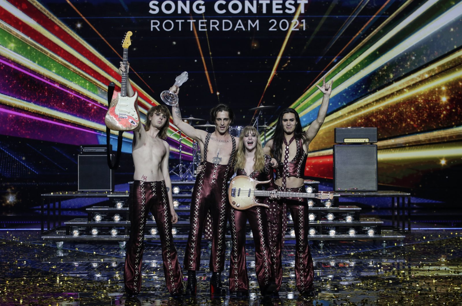 Italy's Maneskin celebrates with the trophy after winning the Grand Final of the Eurovision Song Contest at Ahoy arena in Rotterdam, Netherlands, May 22, 2021. (AP Photo)