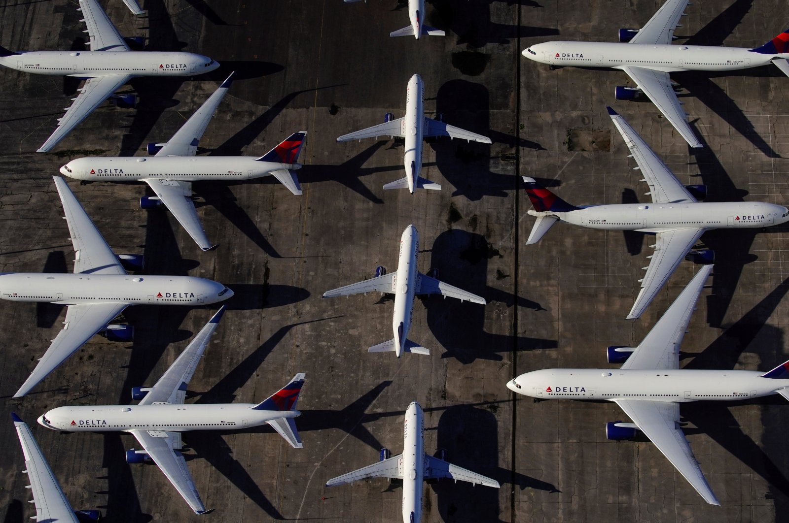 Delta Air Lines passenger planes are seen parked due to flight reductions made to slow the spread of coronavirus, at Birmingham-Shuttlesworth International Airport in Birmingham, Alabama, U.S., March 25, 2020. (Reuters Photo)