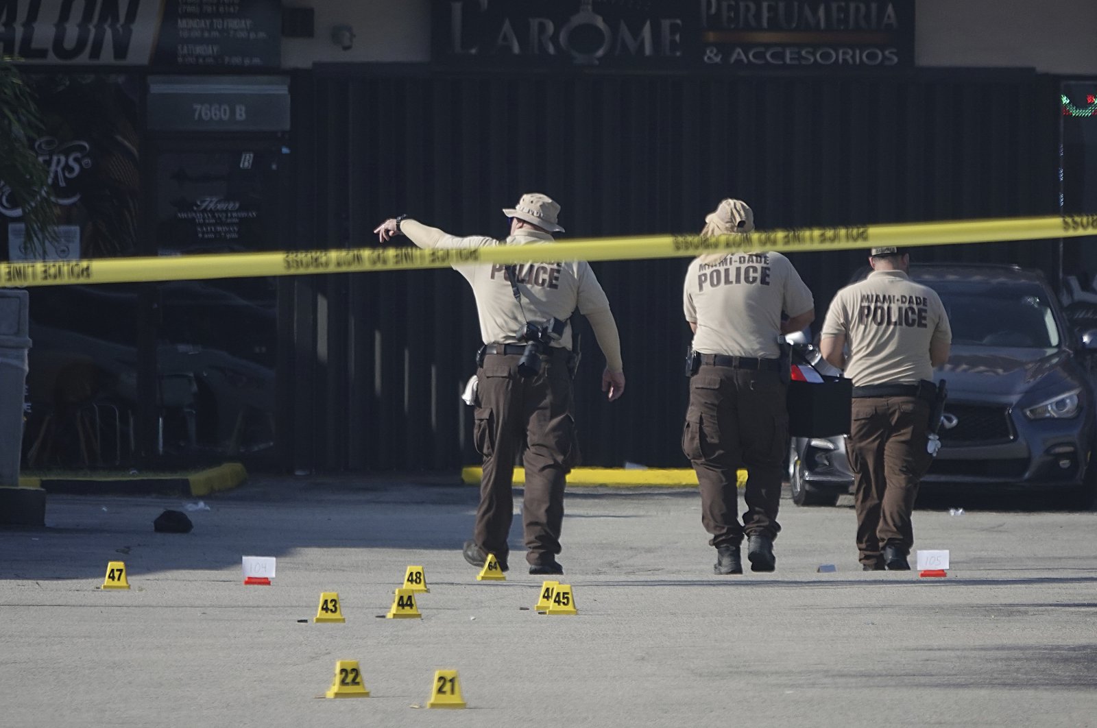Miami-Dade police work the scene of a shooting outside a banquet hall near Hialeah, Florida, May 30, 2021. (AP Photo)
