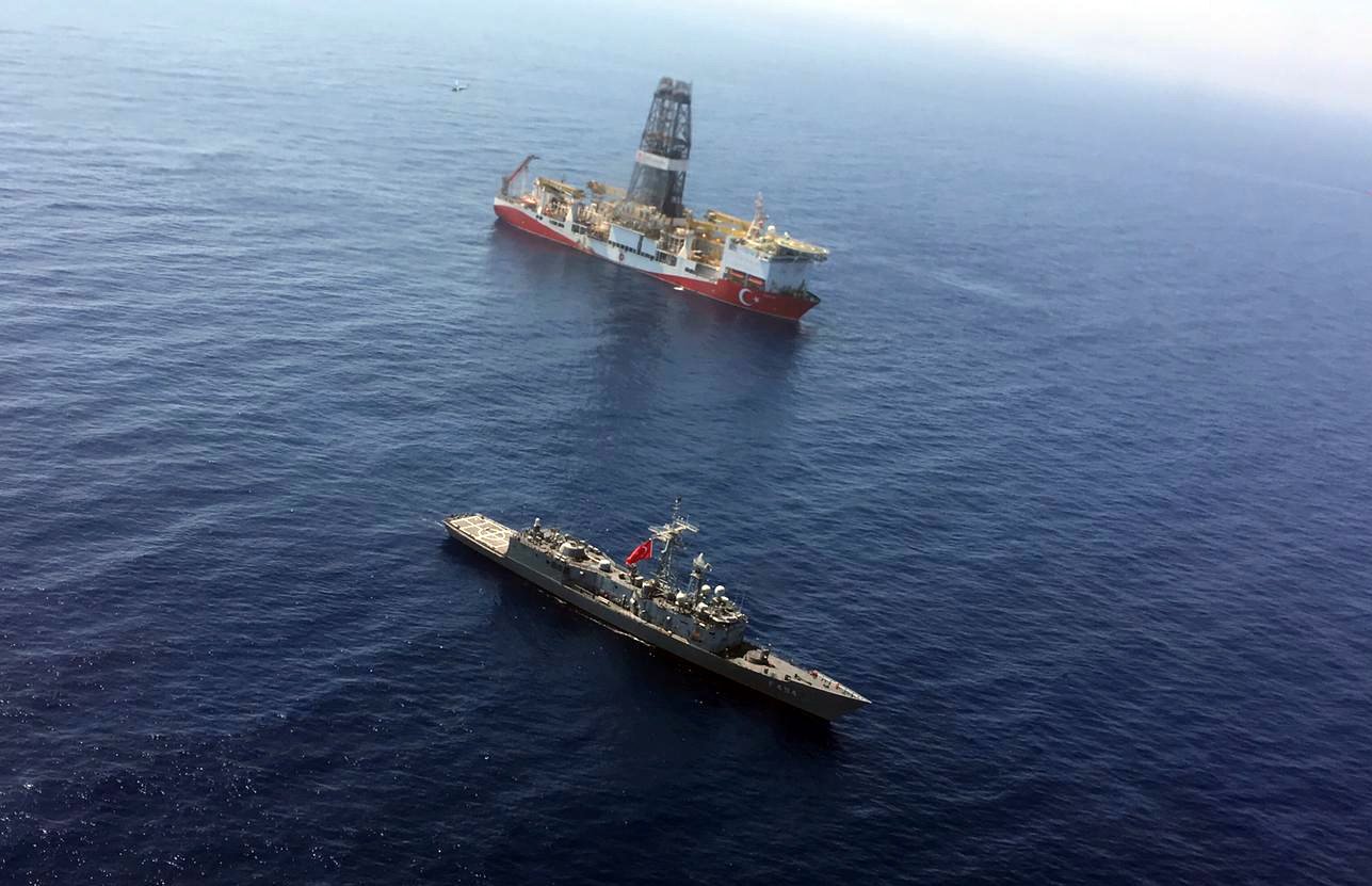 A Turkish navy warship escorts the drill ship Fatih making its way toward the Eastern Mediterranean near Cyprus, July 9, 2019. (AP Photo)
