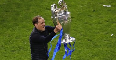 Chelsea manager Thomas Tuchel celebrates with the Champions League trophy at Estadio do Dragao, Porto, Portugal, May 29, 2021. (Reuters Photo)