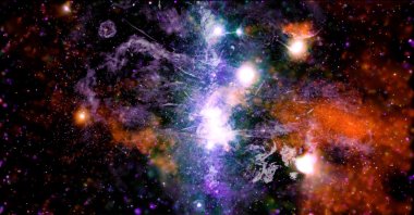 A false-color X-ray and radio frequency composite image shows threads of superheated gas and magnetic fields at the center of the Milky Way galaxy, May 28, 2021. (NASA via EPA)