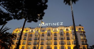 Lights shine upon the Hotel Martinez palace in the evening, on the French riviera city of Cannes, southern France, March 20, 2019. (AFP Photo)