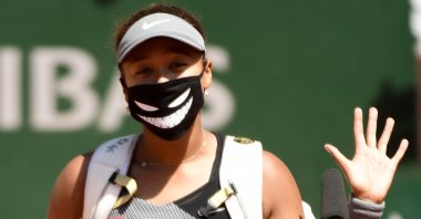 Naomi Osaka of Japan celebrates winning against Patricia Maria Tig of Romania during their first round match at the French Open tennis tournament at Roland ​Garros in Paris, France, May 30, 2021. (EPA Photo)