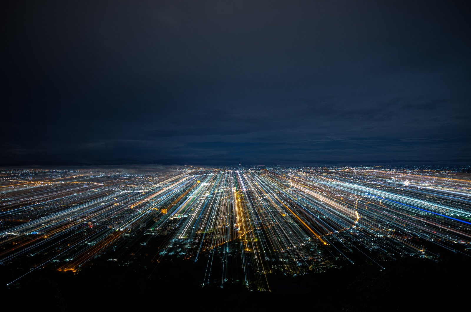 An illustration photo shows an aerial view of a city at night. (Photo by Shutterstock)