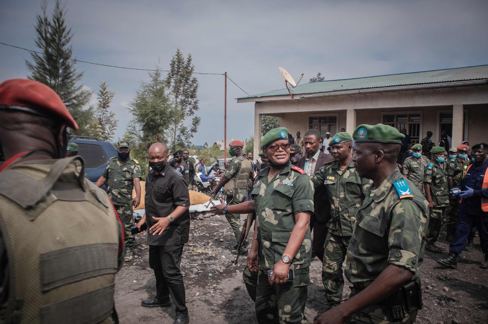 Military governor Lieutenant-General Ndima visits residents displaced by the volcanic eruption of Mount Nyiragongo to distribute government aid in Sake, near Goma, Democratic Republic of Congo, May 29, 2021. (AFP Photo)