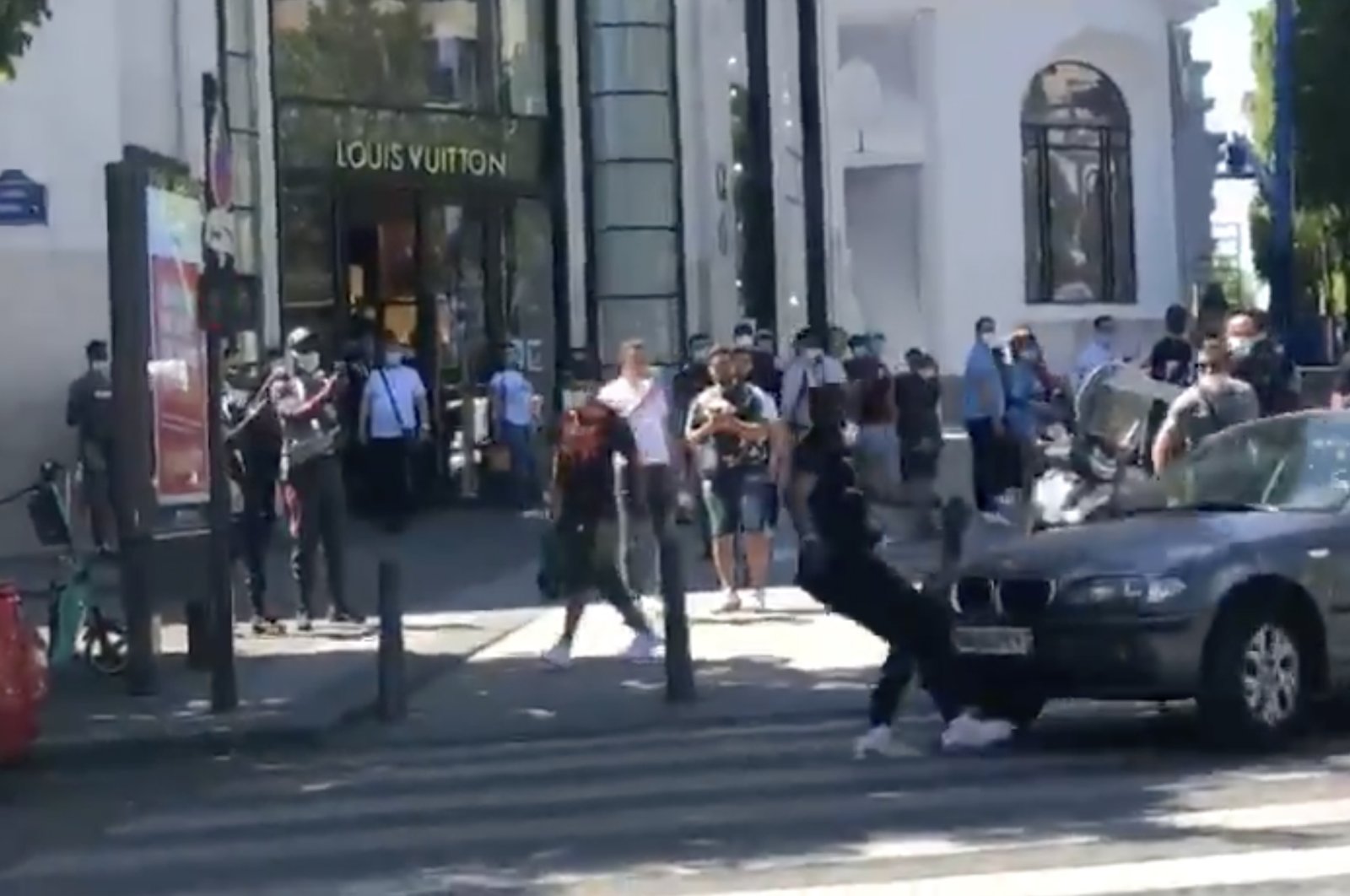 This screengrab shows the moment a black man is hit by a car amid protests in Paris, France, May 31, 2021.