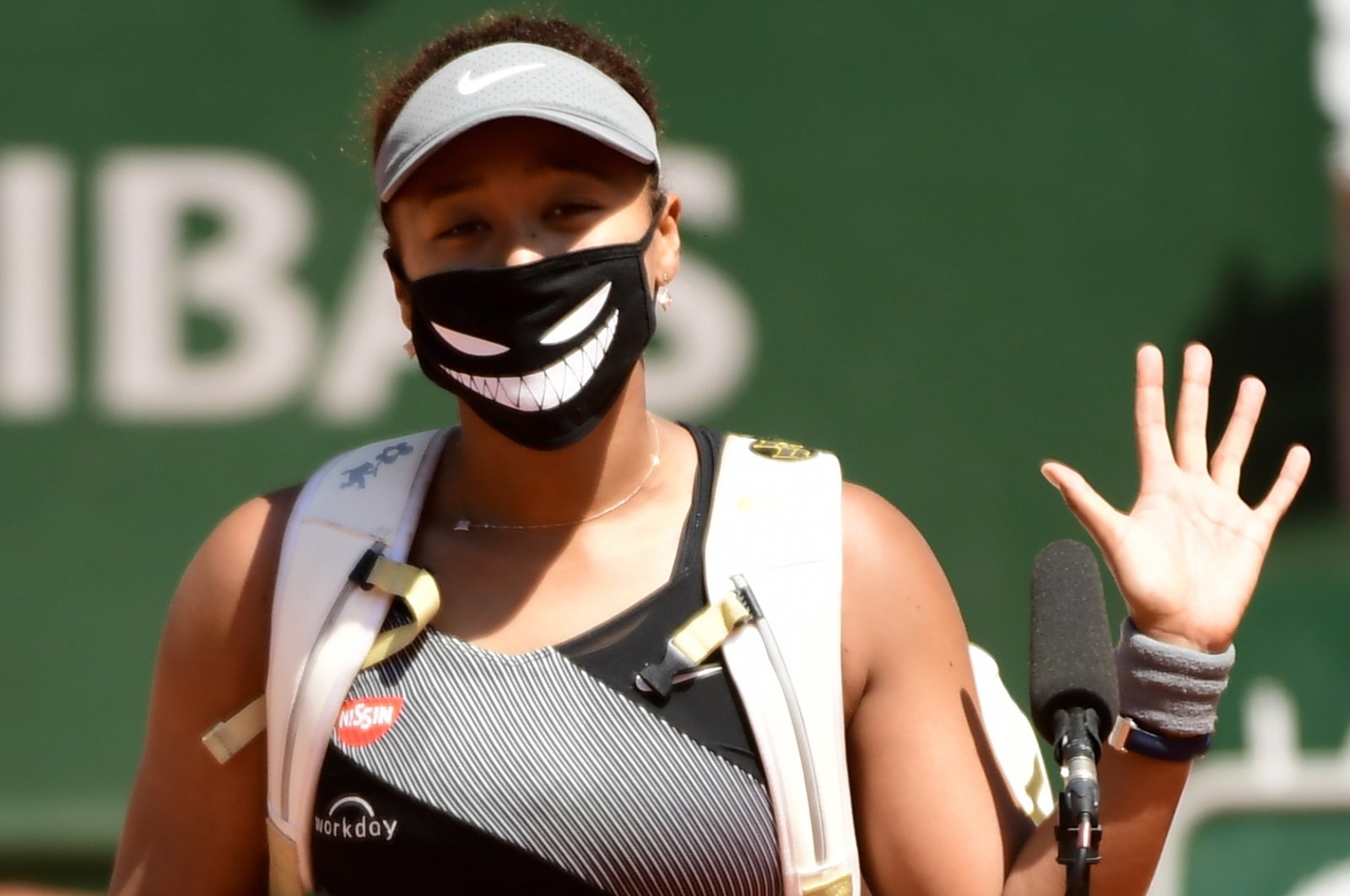 Naomi Osaka of Japan celebrates winning against Patricia Maria Tig of Romania during their first round match at the French Open tennis tournament at Roland ​Garros in Paris, France, May 30, 2021. (EPA Photo)