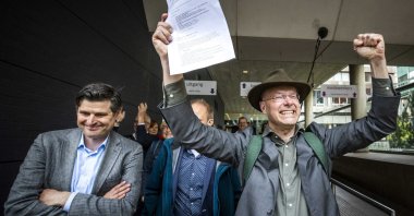 Lawyer Roger Cox (L) and Donald Pols, director of Milieudefensie (Dutch for 'environmental defense'), after the court decision in The Hague, The Netherlands, May 26, 2021. (EPA Photo)