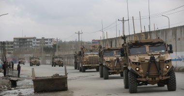 British troops with NATO-led Resolute Support Mission forces drive in Kabul, Afghanistan, March 25, 2020. (AP Photo)
