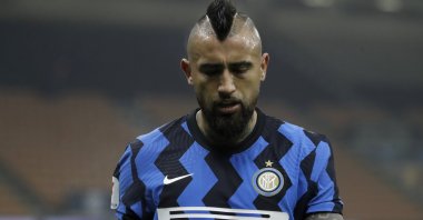 Inter Milan's Arturo Vidal reacts during the Italian Cup semifinal against Juventus at the San Siro, Milan, Italy, Feb. 2, 2021. (AP Photo)