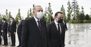 President Recep Tayyip Erdoğan (L) and Georgian Prime Minister Irakli Garibashvili walk towards the entrance at the Presidential Complex, Ankara, Turkey, June 1, 2021. (AA Photo)