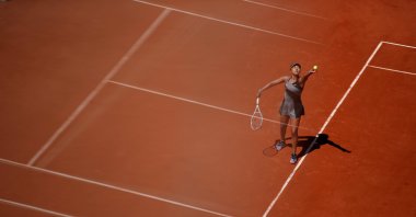 Naomi Osaka in action during her first-round match against Romania's Patricia Maria Tig during the French Open, Roland Garros, Paris, France, May 30, 2021. (Reuters Photo)