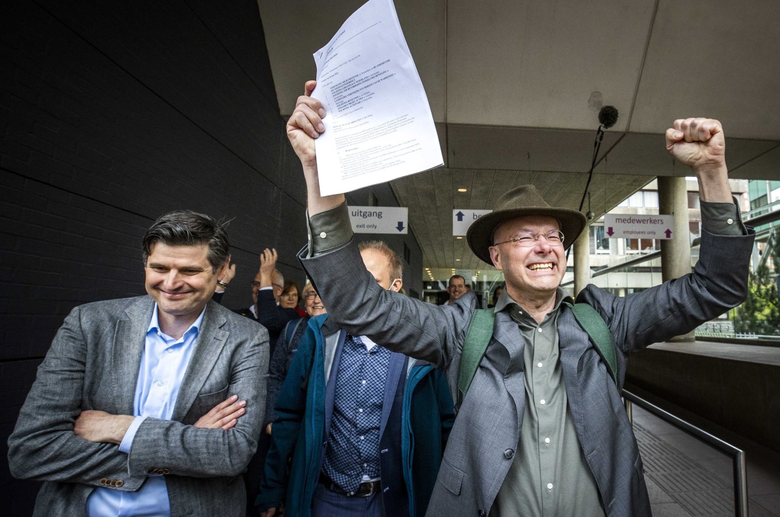 Lawyer Roger Cox (L) and Donald Pols, director of Milieudefensie (Dutch for 'environmental defense'), after the court decision in The Hague, The Netherlands, May 26, 2021. (EPA Photo)