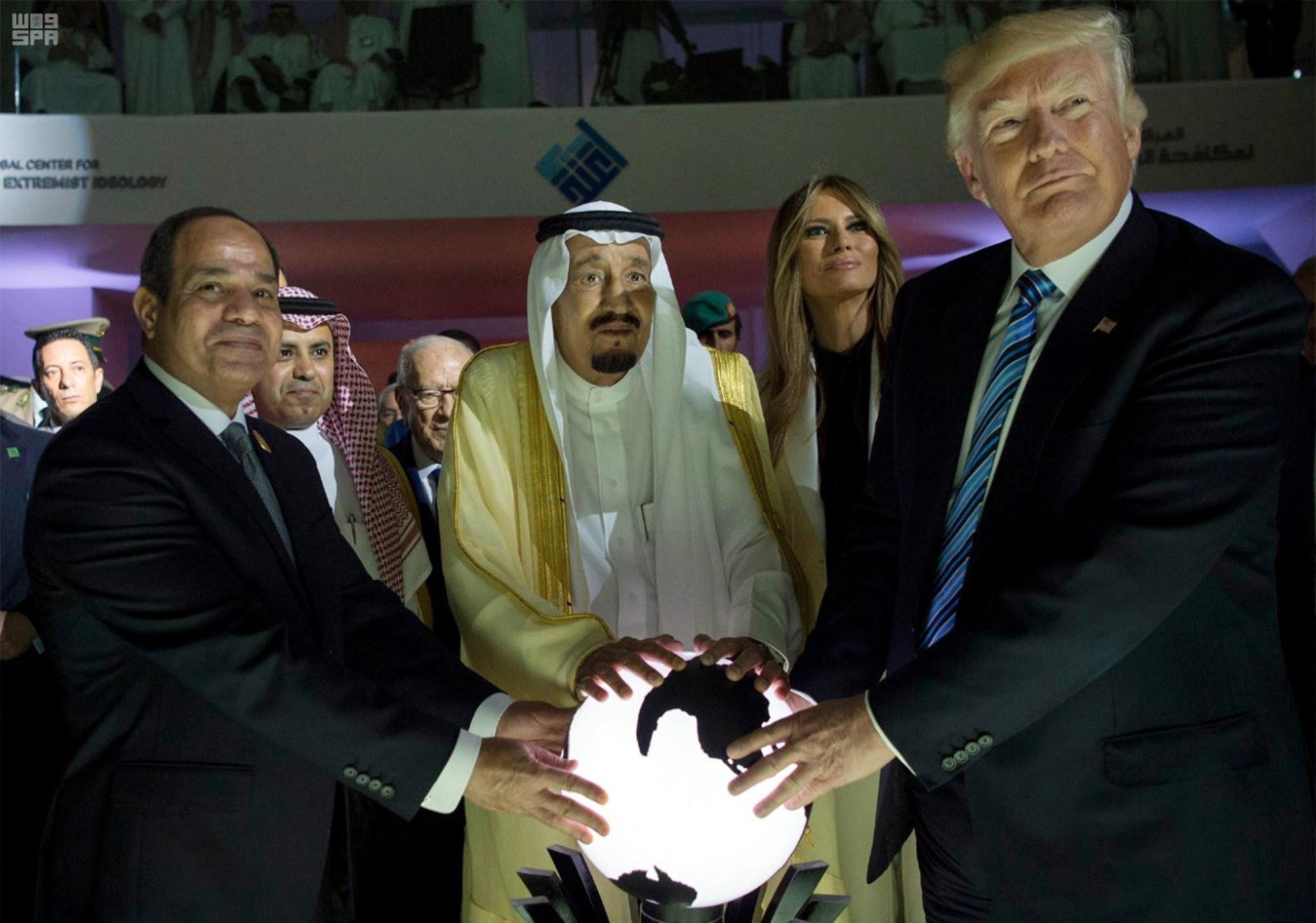 From left to right, Egyptian President Abdel-Fattah el-Sissi, Saudi King Salman, then U.S. First Lady Melania Trump and then U.S. President Donald Trump put their hands on an illuminated globe during the inauguration ceremony of the Global Center for Combating Extremist Ideology, Riyadh, Saudi Arabia, May 21, 2017. (AP Photo)