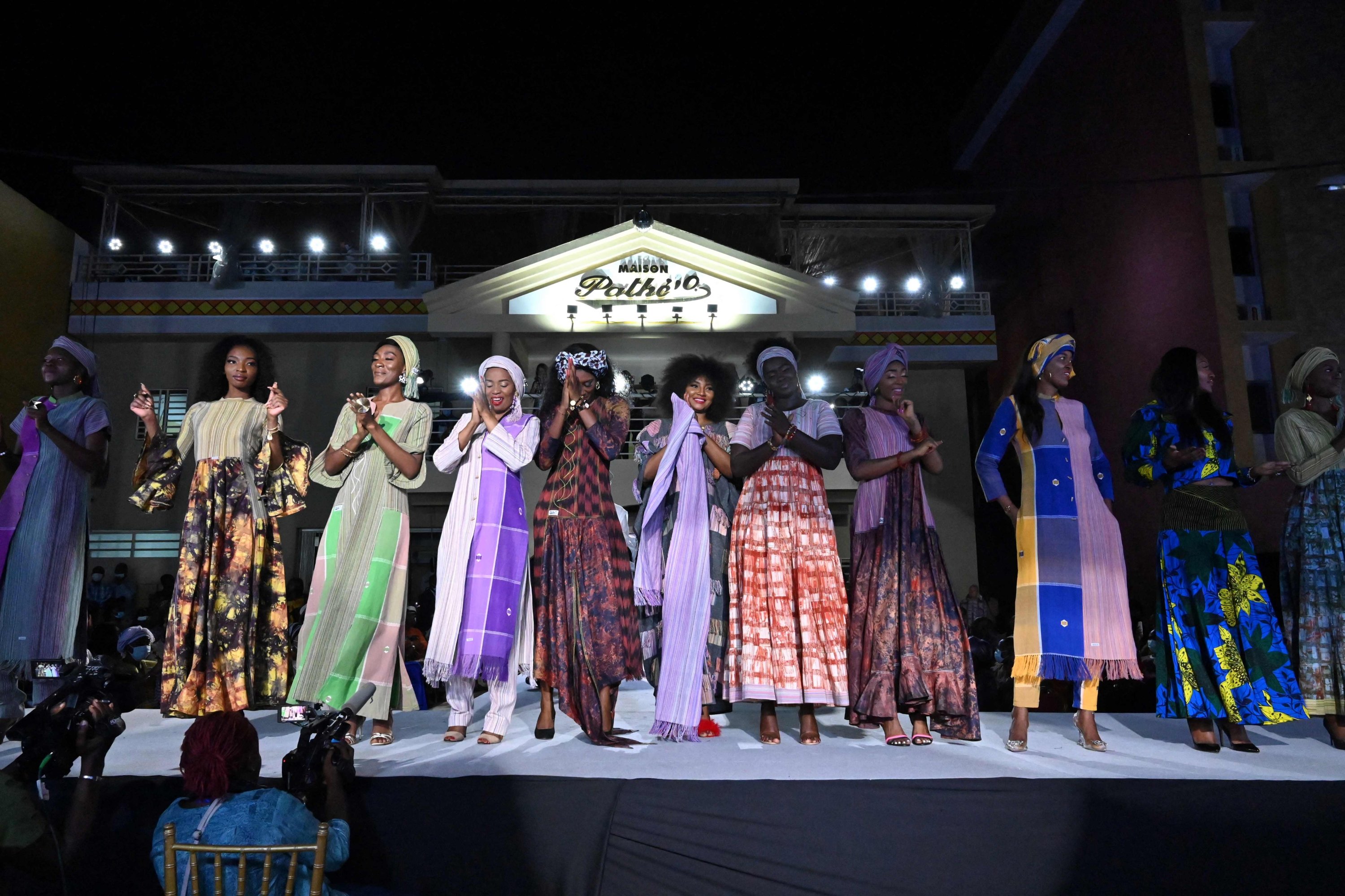 Models present the creations of Pathé'O during a fashion show to celebrate 50 years of 'Maison Pathe'O' in Abidjan, Ivory Coast, May 29, 2021. (AFP Photo)