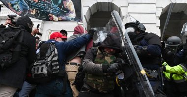 Police push back a crowd of supporters of U.S. President Donald Trump after they stormed the Capitol building in Washington, D.C., U.S., Jan. 6, 2021. (AFP Photo)